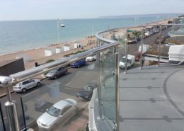 Mirror polished stainless steel glass balustrade installed for a client in Hastings
